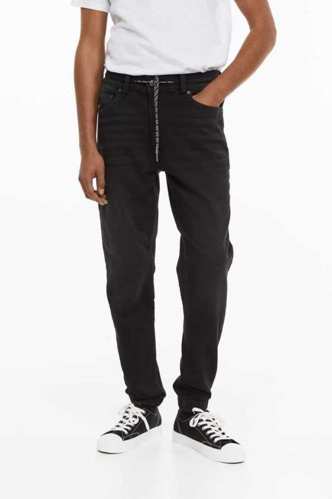 H&M Hybrid Regular Tapered Joggers Hose Herren Schwarz | 8671-XIWOL