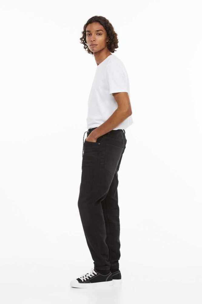 H&M Hybrid Regular Tapered Joggers Hose Herren Schwarz | 8671-XIWOL